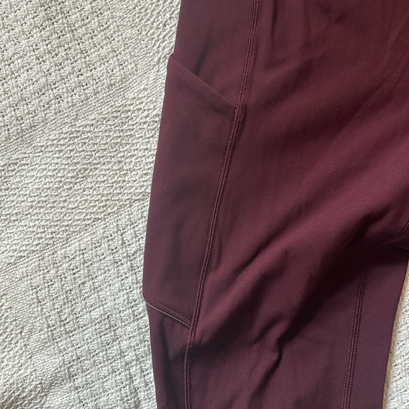 Lululemon Leggings Burgundy. Pockets on side & drawstring in waist. - Picture 2 of 3